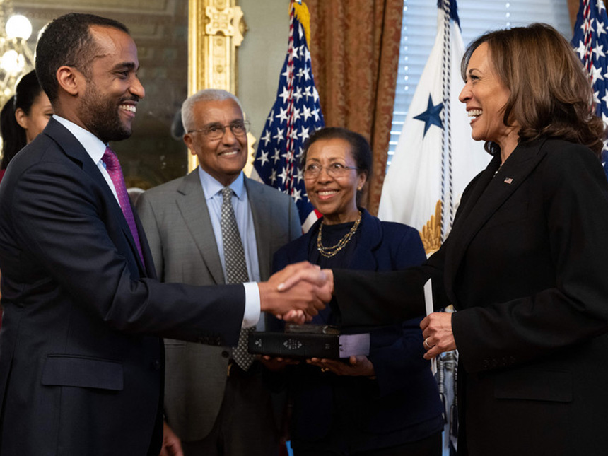 Vice President Kamala Harris (right) shakes hands with Yohannes Abraham.